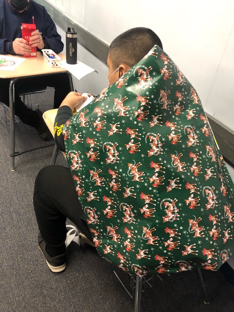 a wrapping paper cape