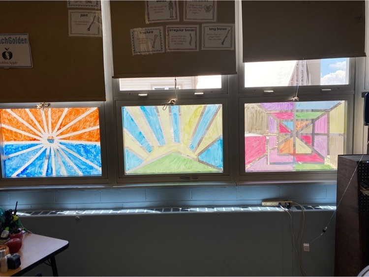 106 brought a little color to the classroom by designing and painting our own DIY stained glass